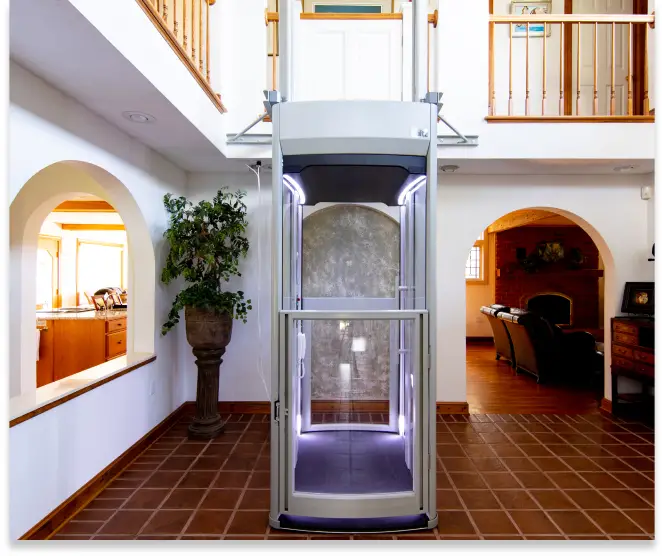 A sleek, small elevator in the middle of a home